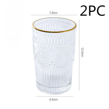 Load image into Gallery viewer, Sun Embossed Glass - Set of 2
